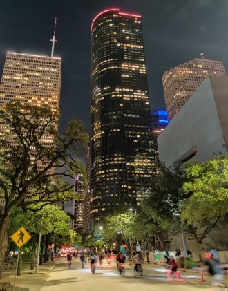 Cycling in Downtown Houston at night, Houston, Texas, USA